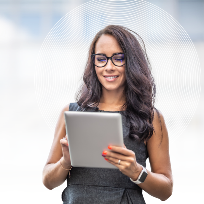 Woman using computer tablet to check smartcard registrations