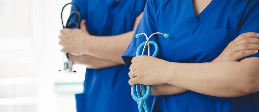 Clinical man and woman with medical equipment