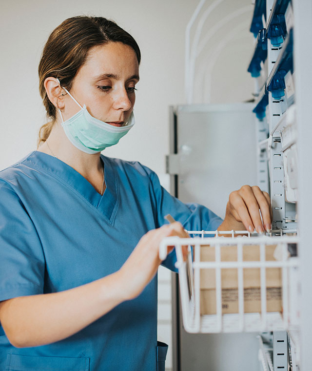 Nurse looking for medical supplies
