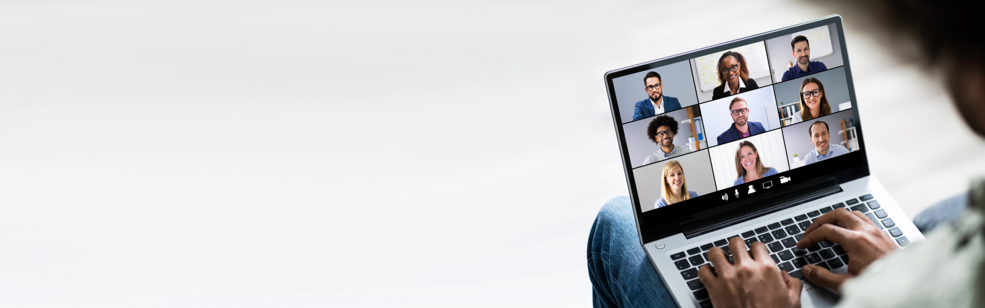 A young male sat on a video call.