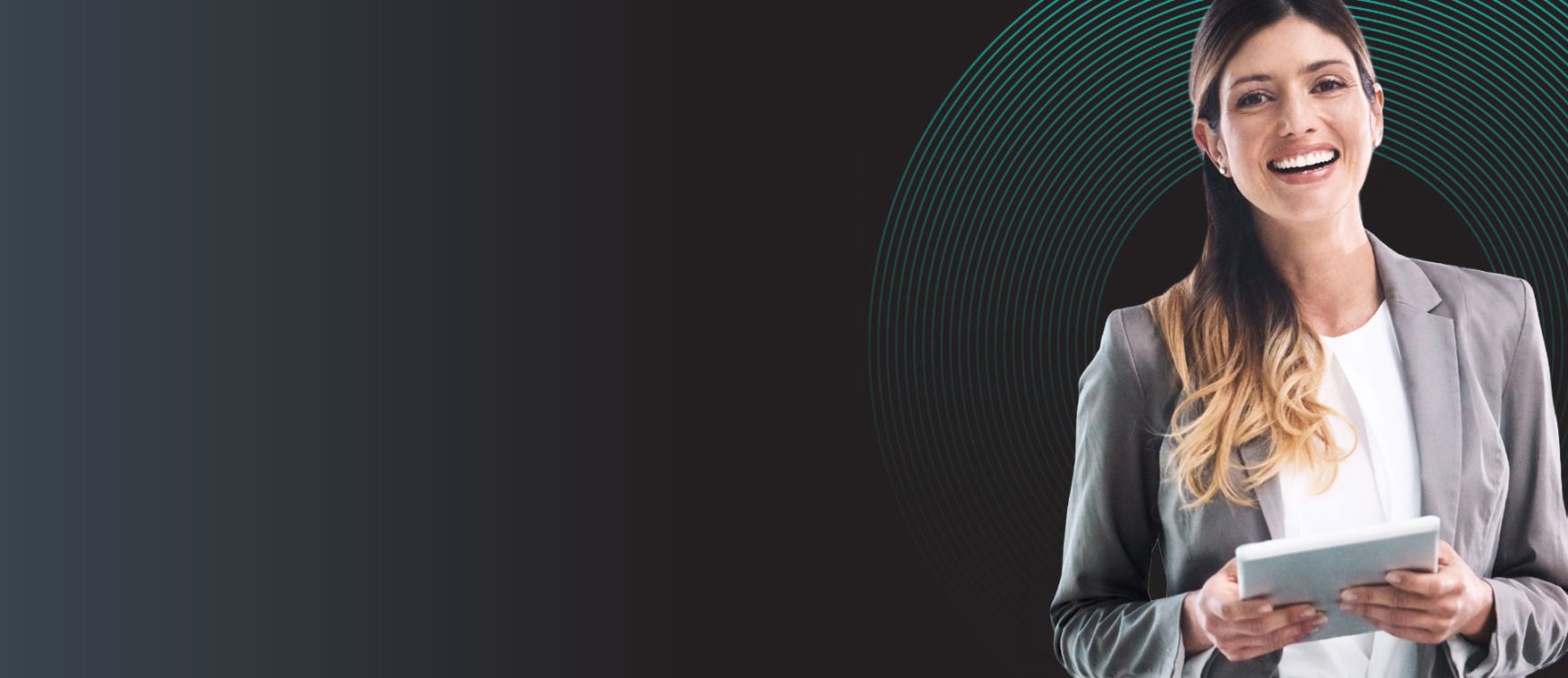 woman holding computer tablet looking for business service framework agreements for the NHS and Wider Public Sector