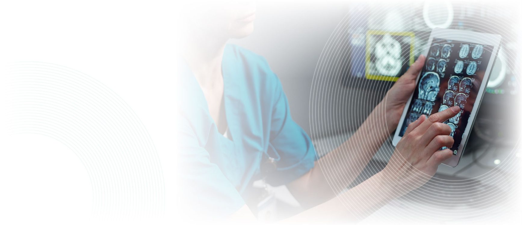 a nurse holding a computer tablet showing digital scans