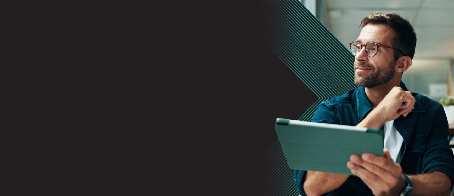 framework agreement banner showing a man holding a mobile tablet