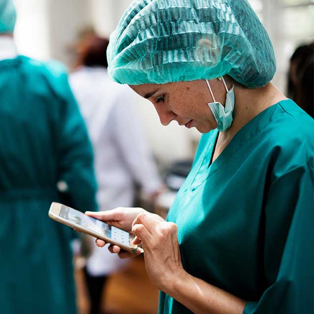 Doctor using mobile phone