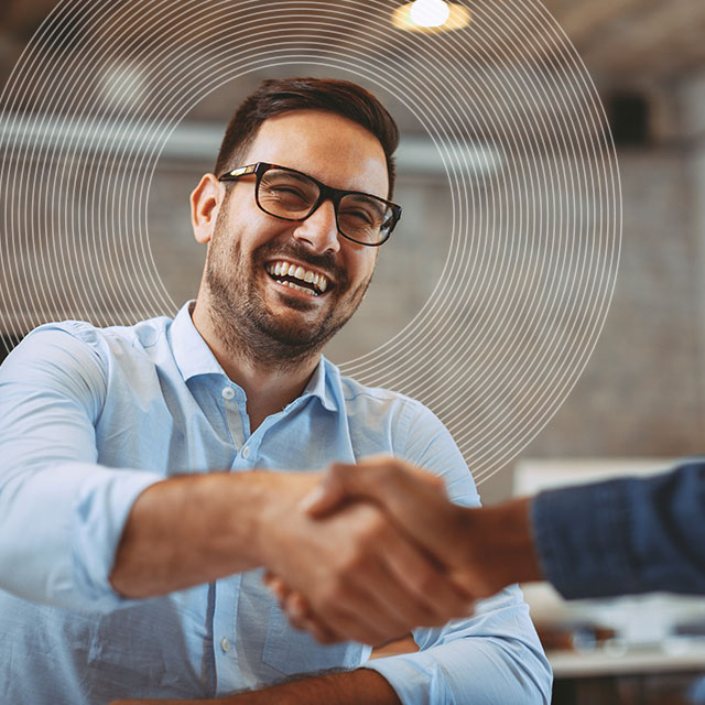 NHS Workforce Consultancy, two people shaking hands